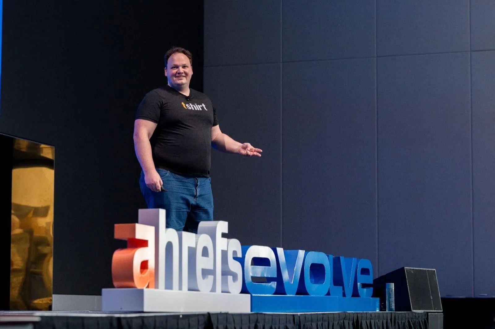 Patrick Stox speaking on stage